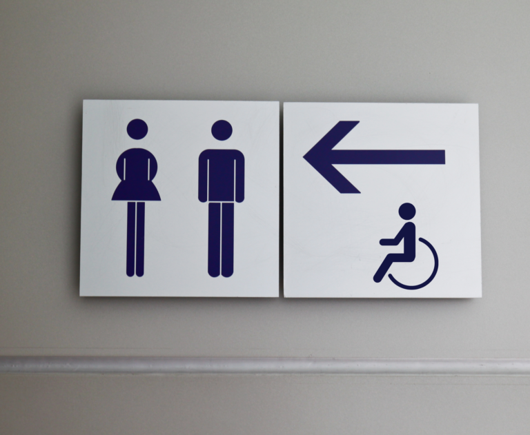 Toilet sign and direction