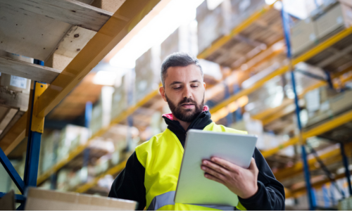 Male Warehouse Worker with tab